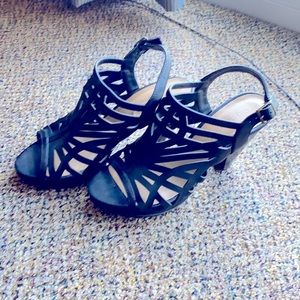 Size 7 laser cut black heeled shoes